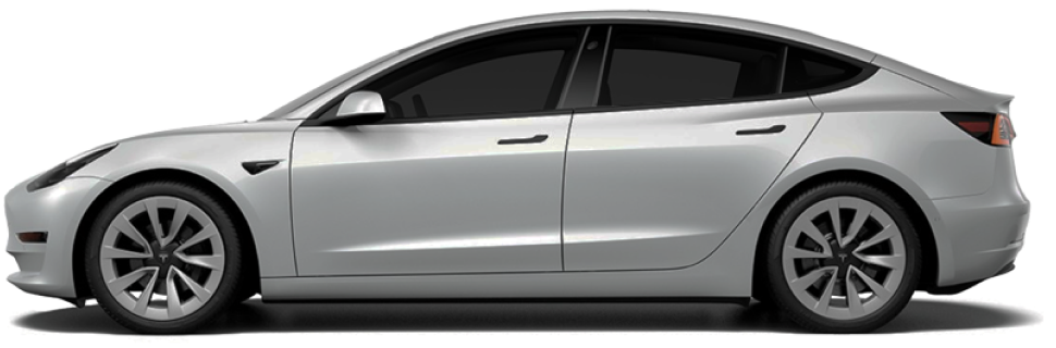 A silver Tesla Model 3 with 30% window tint, providing a subtle shade that balances visibility and heat reduction. The sleek side profile highlights its aerodynamic design and stylish Tesla wheels.